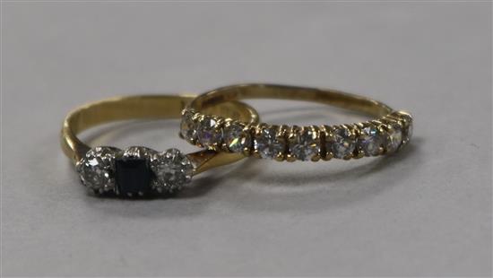 An 18ct gold and gem set ring and a 9ct gold gem set ring.